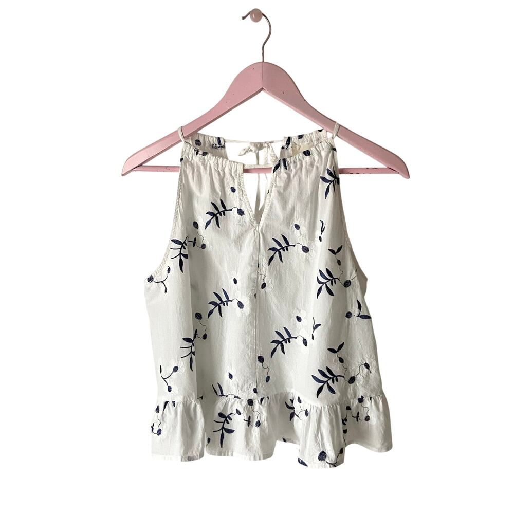 Anthropologie White Sleeveless Peplum Top with Navy Floral Print